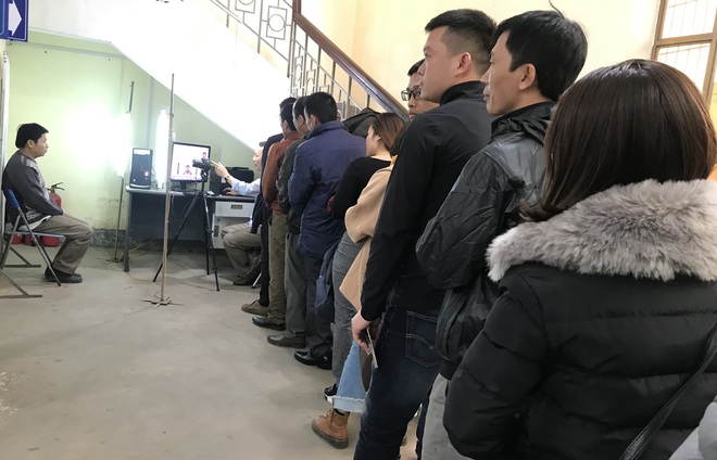 Nghệ An: Đeo khẩu trang đi làm hộ chiếu, tạm hủy kế hoạch sang Trung Quốc lao động vì lo ngại virus corona - Ảnh 4.