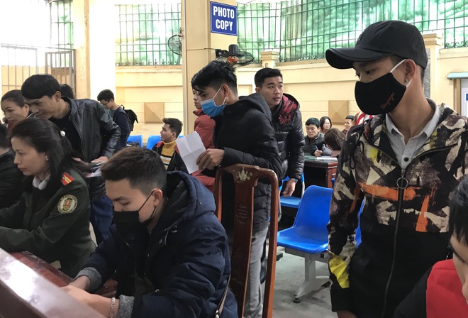 Nghệ An: Đeo khẩu trang đi làm hộ chiếu, tạm hủy kế hoạch sang Trung Quốc lao động vì lo ngại virus corona - Ảnh 7.