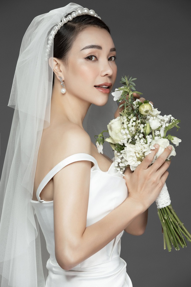 Trà Ngọc Hằng mặc váy cưới gợi cảm, khẳng định chưa có tình yêu mới - Ảnh 9.