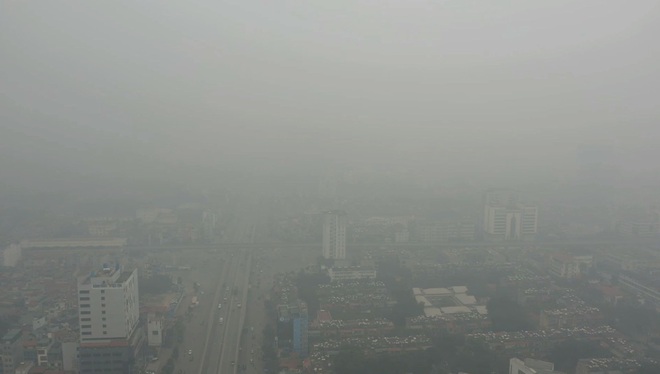 Nhiều tòa nhà mờ ảo nhìn từ flycam, chất lượng không khí ở Hà Nội suy giảm - Ảnh 5.