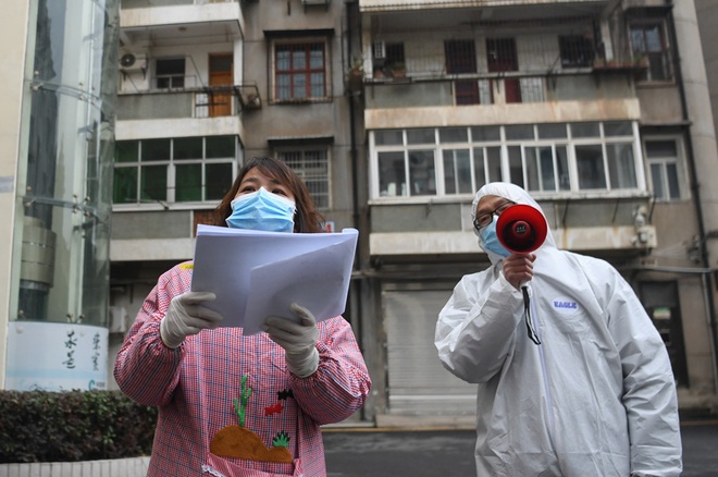 Dùng trạng thái thời chiến: Siết chặt giám sát chưa từng thấy, TQ quyết không để lọt virus corona - Ảnh 1.