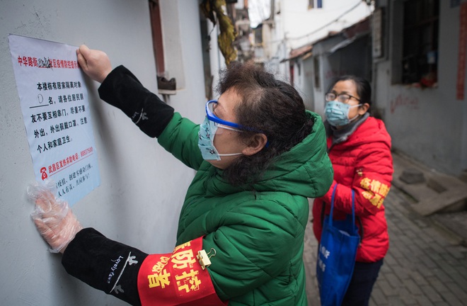 Dùng trạng thái thời chiến: Siết chặt giám sát chưa từng thấy, TQ quyết không để lọt virus corona - Ảnh 11.