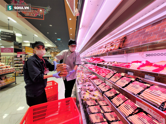 Chỉ trong 1 giờ, nhiều siêu thị ở Hà Nội bổ sung thần tốc nhu yếu phẩm cung ứng cho người dân - Ảnh 2.