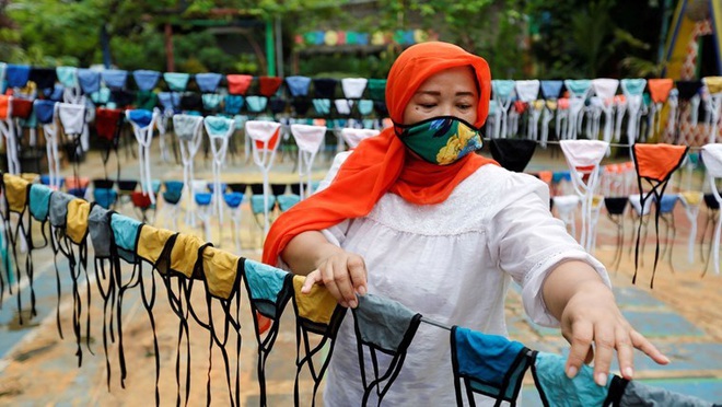 COVID-19: Indonesia trở thành điểm nóng dịch bệnh lớn nhất ĐNÁ; WHO lên tiếng về việc TQ điều chỉnh số liệu - Ảnh 1.