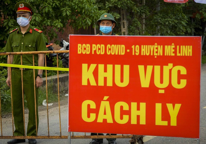 Cuộc sống người dân Hạ Lôi nơi có bệnh nhân 243 mắc COVID-19 trong ngày đầu cách ly - Ảnh 1.