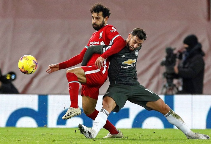 Chấm điểm cầu thủ MU: Luke Shaw, Wan-Bissaka bỏ Salah, Mane vào túi quần - Ảnh 9.