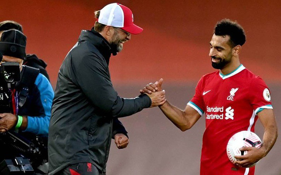 HLV Jurgen Klopp khẳng định Mohamed Salah vẫn đanh hạnh phúc. Ảnh: Getty Images