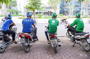Grab thâu tóm Uber
