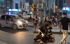 Thanh niên bế đứa trẻ chặn đầu xe trên phố Hà Nội, gặp ai cũng ra lệnh "quỳ xuống": Clip bức xúc