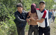 Hình ảnh nghi phạm giết người ở Hóc Môn bị bắt khi đang lẩn trốn ở cánh đồng chanh