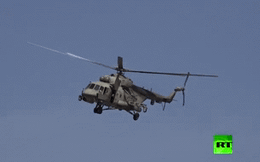 Clip:Nga điều trực thăng chiến đấu hộ tống thiết giáp tuần tra ở Syria