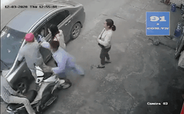 CLIP: Định hành hung nữ tài xế, 2 người đàn ông bị nam bệnh nhân tung cú đấm thẳng mặt
