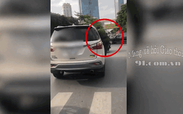 CLIP: Mặc cảnh sát đu bám, tài xế phóng ô tô phóng ngược chiều và cái kết ê chề giữa đường