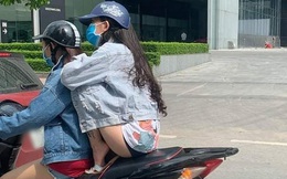 Cô gái ngồi xe máy chẳng thà làm hành động nguy hiểm chứ nhất quyết không để cặp đùi bị cháy nắng khiến dân mạng "ném đá" không thương tiếc