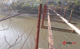 Thanh Hóa: Huyện không có tiền tháo cầu treo cũ hỏng, người dân bám dây cáp băng qua sông