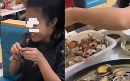 Đi ăn buffet hải sản, cô gái vô tư đánh chén tận 100 con bào ngư, phản ứng khó chịu của ông chủ gây tranh cãi