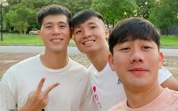 Đình Trọng nắm tay Tiến Dũng tung tăng đi tập