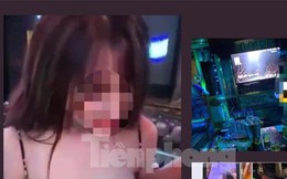 Nhóm thanh niên nam nữ uống rượu, thoát y trong quán karaoke