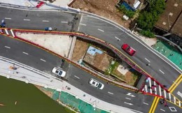 Ngôi nhà 40m2 không chịu di dời khiến cầu cao tốc phải 'tách đôi' ở Trung Quốc: Được đền bù thỏa đáng nhưng không chấp nhận, kết cục phải sống giữa khói bụi và tiếng ồn