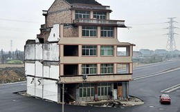 Ngôi nhà 5 tầng "nằm chắn" giữa đường ở Trung Quốc: Sau 4 năm thuyết phục mới chịu di dời, nguyên nhân đằng sau khiến nhiều người ngao ngán