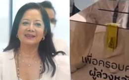Mẹ diễn viên Chiếc Lá Bay gây tranh cãi: Đặt thùng quyên góp, cười tươi rói ngày tiễn con