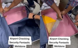 Sau khi qua máy quét an ninh sân bay, vali bị nhân viên xé toang khiến tất cả ngỡ ngàng