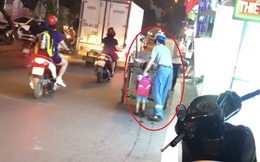 Bé gái 4 tuổi theo bố lao công đi gom rác ở Hà Nội, 25 giây khiến ai cũng ngoái nhìn