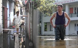 Nước ngập cả tuần, hàng trăm hộ dân giữa thủ đô bắc cầu khỉ để di chuyển