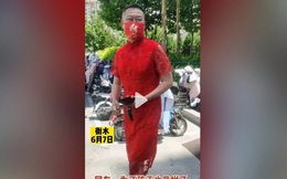 Đàn ông Trung Quốc đua nhau mặc sườn xám để cổ vũ sĩ tử thi Đại học