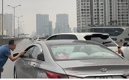Làm rõ video tài xế Porsche chặn đầu ô tô khác để... "phun nước miếng"
