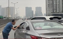 Chủ ô tô Porsche chặn đầu, nhổ nước bọt vào tài xế khác bị công an mời làm việc