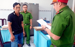 Khởi tố hai cha con tấn công cảnh sát giao thông