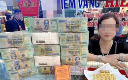 Thực hư một phụ nữ trúng số độc đắc 9 tỷ đồng, rạng rỡ mua vàng bên 'đống tiền'
