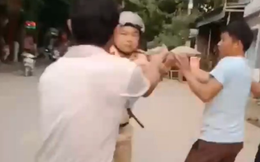 Bị nhóm người đuổi đánh, cán bộ CSGT rút súng bắn chỉ thiên