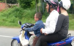 Nhóc 5 tuổi chở 2 người lớn phóng xe “như bay” gây sốc