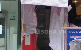 Cảnh sát khám nghiệm máy ATM của Maritime Bank bị trộm đục phá