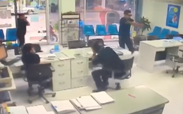 Xông vào cơ quan bắn chết bạn gái cũ