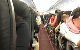 Vợ hơn 10 tuổi đấm chồng sưng mắt trên máy bay