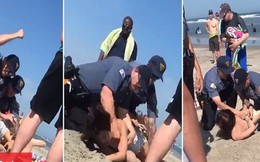 Cảnh sát Mỹ đấm túi bụi phụ nữ trên bãi biển gây bức xúc
