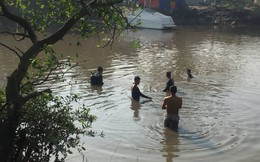 Người nhái quần thảo nhiều giờ tìm nạn nhân nghi rớt xuống sông ở Sài Gòn