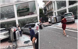Hà Nội: Xe Vios đâm vỡ cửa kính, phi từ tầng 2 xuống khiến 2 ô tô gặp họa