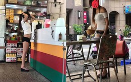 Mặc mát mẻ đứng phục vụ đồ ăn, cô gái khiến người xung quanh nóng mắt