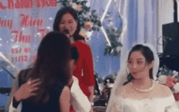 Bỏ mặc cô dâu 'mặt lạnh' đứng bên cạnh, chú rể ôm 'cô gái lạ' gục đầu khóc trong đám cưới gây xôn xao