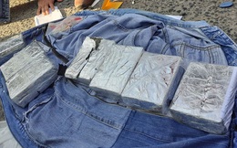 Dùng ôtô tàng trữ 14 bánh heroin