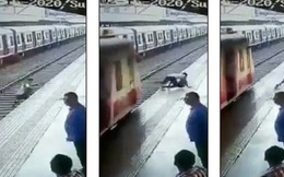 Cậu bé thoát chết trong gang tấc khi vượt đầu tàu hỏa