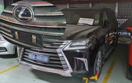 Xe biển xanh 80A bị khóa bánh ở Tân Sơn Nhất: Đại diện chủ xe nói 'biển giả do lái xe tự gắn'