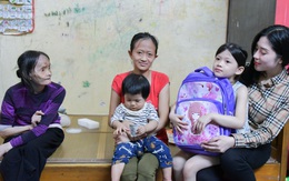 Hoa hậu Tô Diệp Hà nhận đỡ đầu em bé ăn xin có mẹ bị não úng thủy