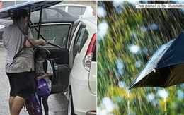 Malaysia: Bức ảnh người mẹ 'che ô' cho con theo cách đặc biệt khiến nhiều người xúc động