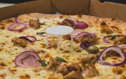 Chiếc "kiềng 3 chân" trong mỗi hộp pizza dùng để làm gì?