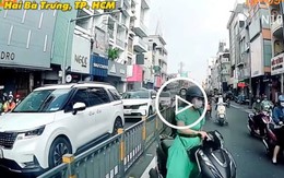 Xe máy ùn ùn đi ngược chiều trên đường Hai Bà Trưng, TP.HCM